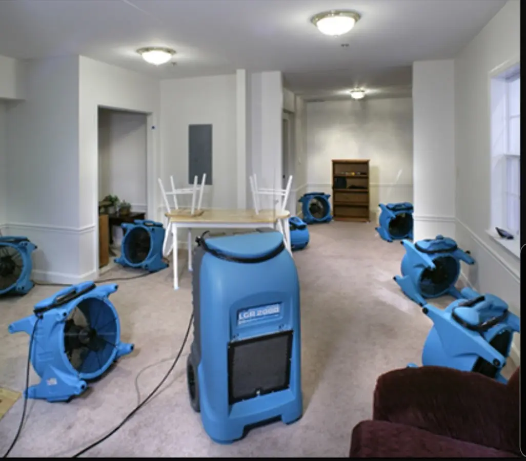 Air movers and dehumidifier setup for Water Damage Restoration in Lakeland Village